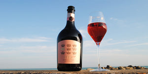 A glass and bottle of Fitz Pink English sparkling wine