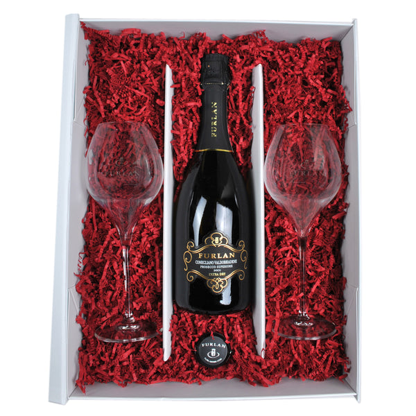 Furlan wine bottle with two glasses in a decorative box with red crinkle paper
